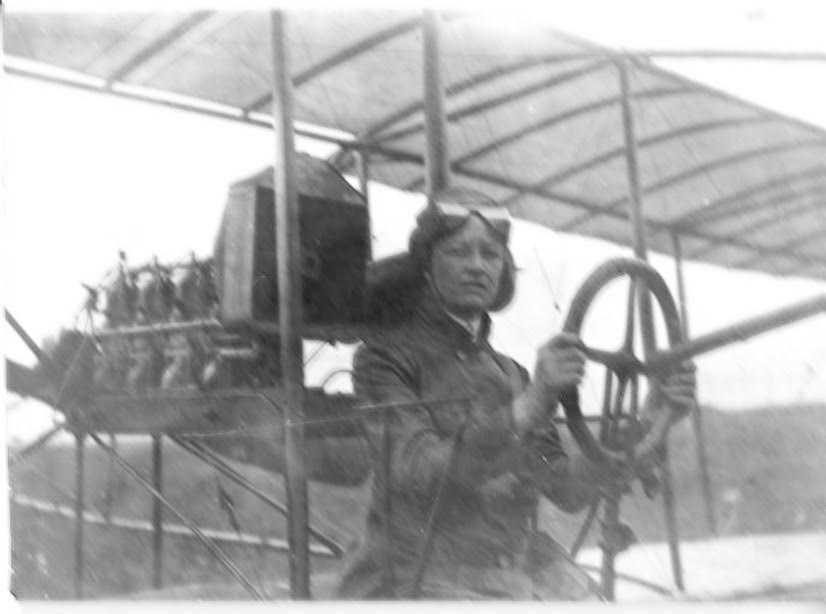 Bessica Faith Raiche seated at the controls on her plane 